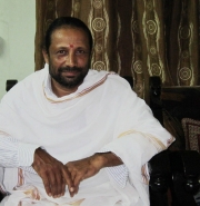 Holy Man visiting a Family